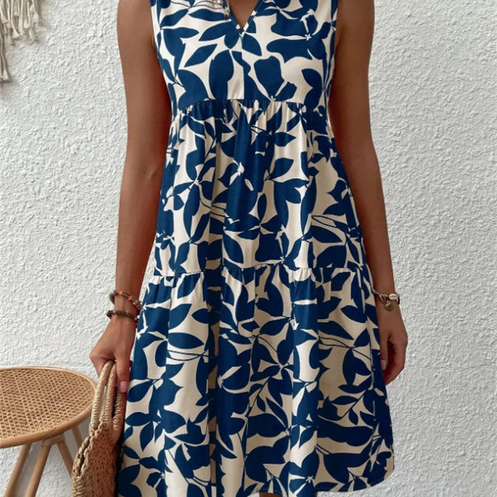 TASHA | FLOWY MIDI DRESS WITH A FLARE